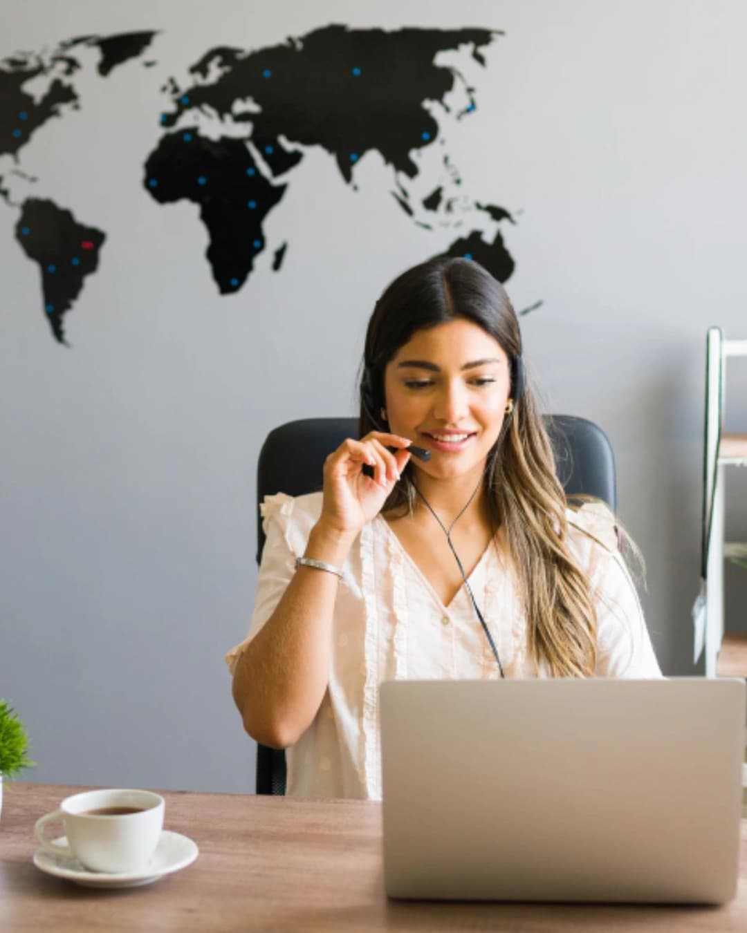 Wind turbine over coastal landscape representing sustainable energy solutions